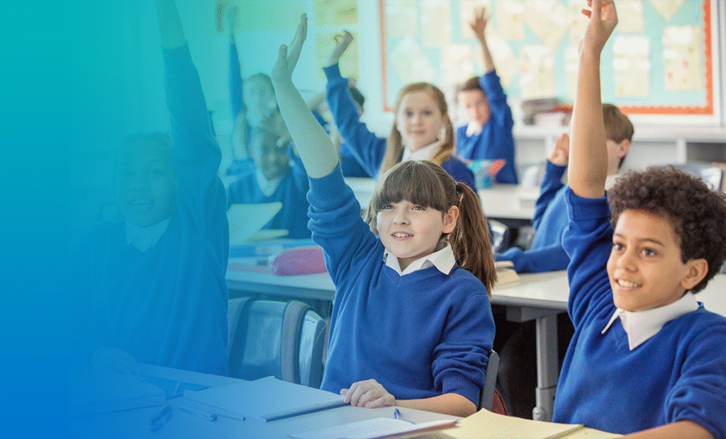 kids-in-classroom-raising-their-hands