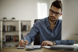 Private K-12 school business manager calculating net tuition revenue